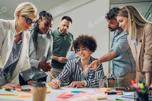 Preview: Multiracial business team on a meeting in a modern bright office