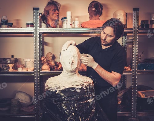 Preview: Men during lifecasting process in a prosthetic special fx workshop