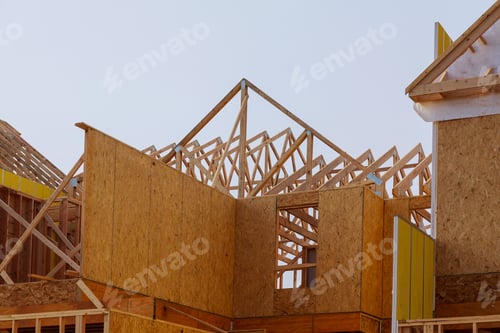 Preview: Construction of roof wood frame residential building under construction