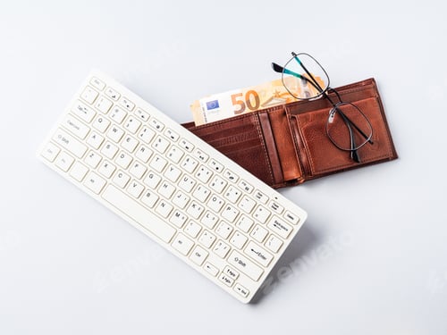 Preview: Euro money banknotes in wallet, keyboard and glasses, online banking, business, student loan concept