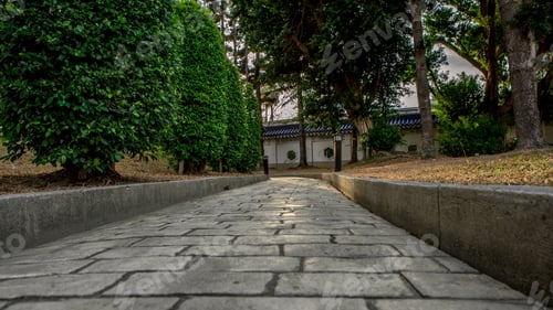 Preview: Paving stone road. Old pavement of square cobblestone sidewalk.
