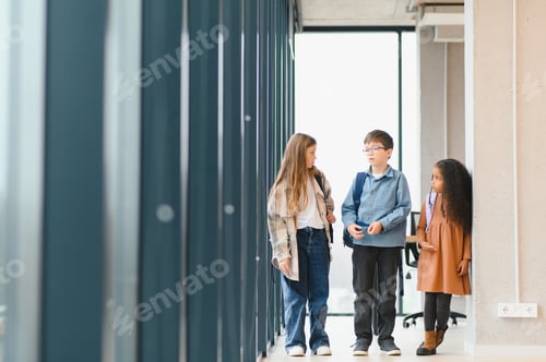 Preview: Group of elementary school kids in a school corridor
