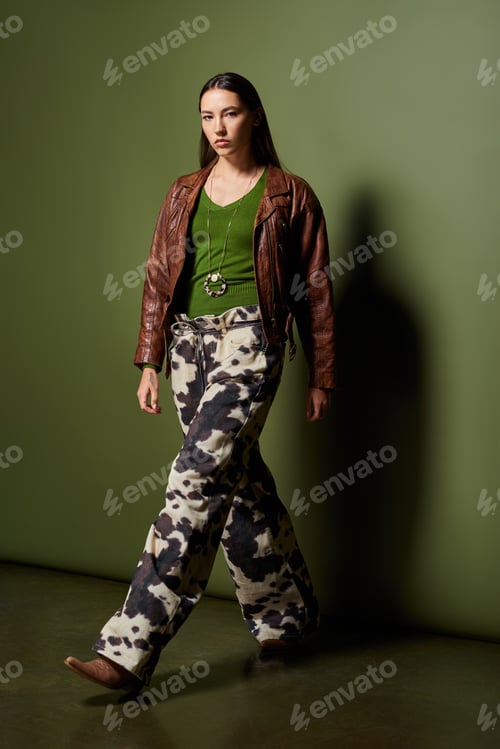 Preview: Striking the balance of fashion and confidence in a vibrant setting with a dynamic pose