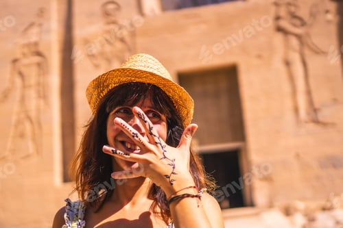 Preview: A Tourist With A Nubian Black Gem Tattoo At The Temple Of Philae, A Greco-Roman Construction Seen