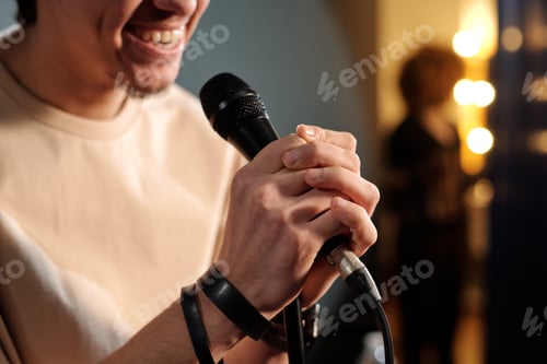 Preview: Hands of young stand up comedian