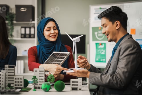 Preview: Diverse team, middle-aged Asian businessman, Caucasian young businesswoman, Muslim hijab-wearing