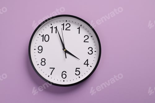 Preview: Close-up of a wall clock. The concept of time and work time is valuable for life