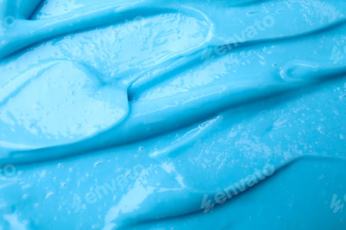Preview: Texture of light blue professional face mask as background, closeup