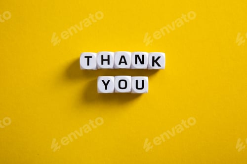 Preview: Block with word Thank You on yellow background