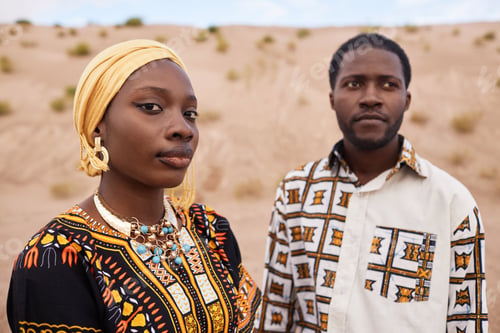 Preview: African American Couple in Traditional Clothing Together in Desert Setting