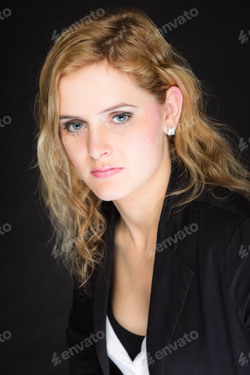 Preview: Closeup Studio Portrait Of Pretty Young Woman With Pink Lipstick And Long Blond Hair. Wearing A