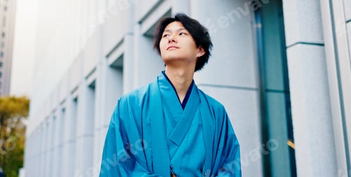 Preview: Japanese man, thinking and urban city with traditional fashion, outfit and yukata for heritage. Tra