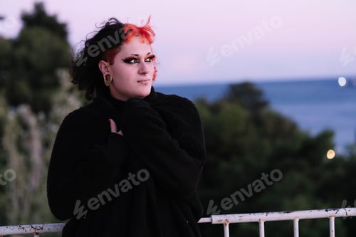Preview: Portrait of a transgender woman with painted hair.