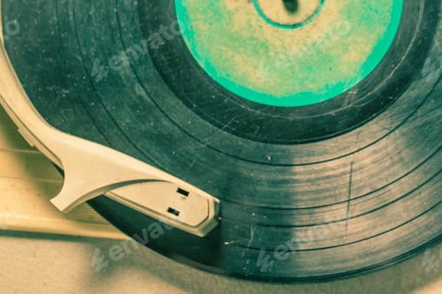 Preview: Vintage record player with few black vinyl records