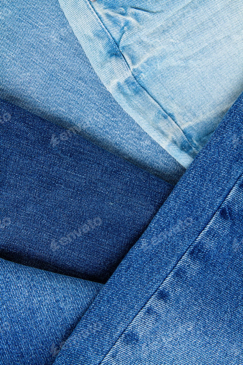 Preview: Flat lay of classic blue jeans. Urban outfit, basic essencial wardrobe, shopping concept. Top view