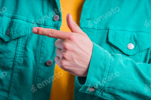 Preview: Hand of man presenting something, pointing on left side
