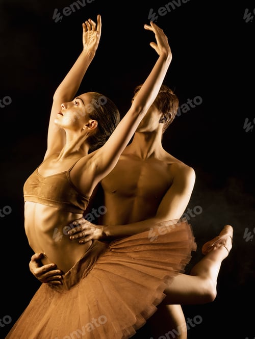 Preview: Professional, emotional ballet dancers on dark scene performed by sexual couple with golden body art