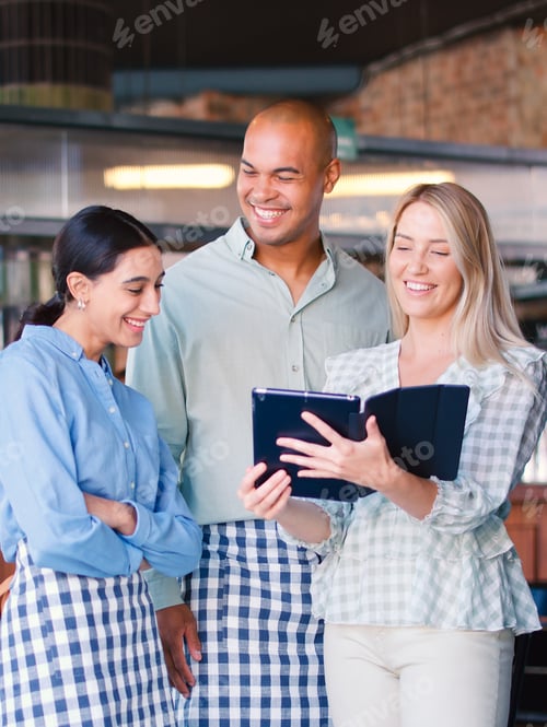 Preview: Multi-Cultural Staff Team Working In Restaurant Or Coffee Shop