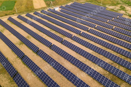 Preview: Aerial view of solar power plant. Electric panels for producing clean ecologic energy