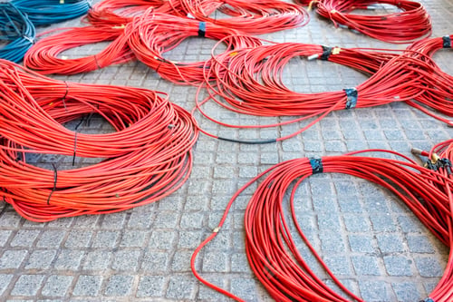 Preview: Large rolls of data cables ready to connect television data center