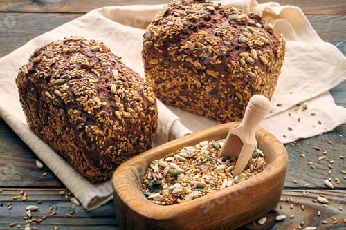 Preview: Homemade bread on dark wooden table