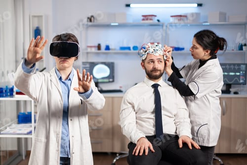 Preview: Neuroscientist developing diagnosis wearing virtual reality headset