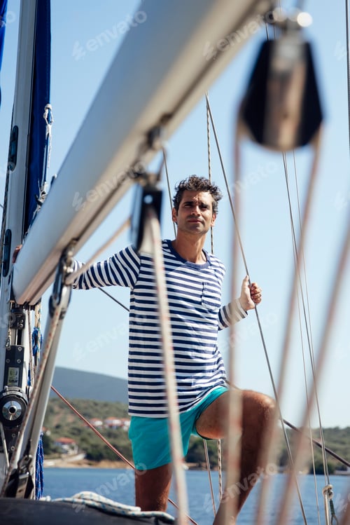 Preview: Young man on a sailboat