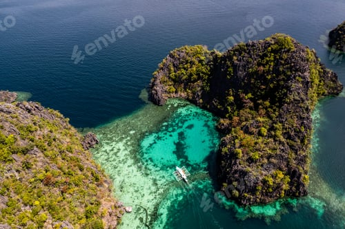 Preview: Aerial view of Twin Lagoon turquoise waters with a drone The Philippines Coron