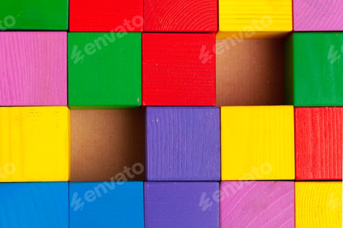 Preview: Colorful wooden blocks background, top view