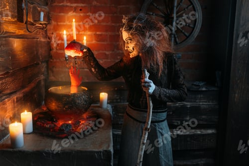 Preview: Witch reads spell over pot with human body parts