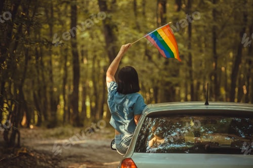 Preview: Young woman with LGBT flag.