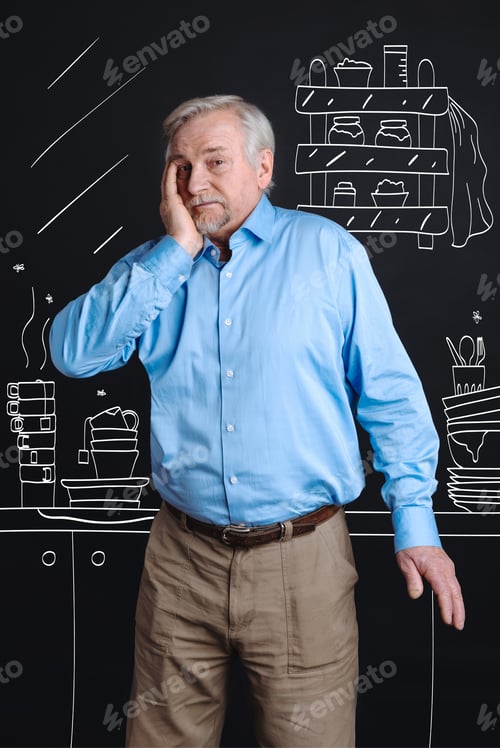 Preview: Depressed Unhappy Man Looking At His Dirty Kitchen