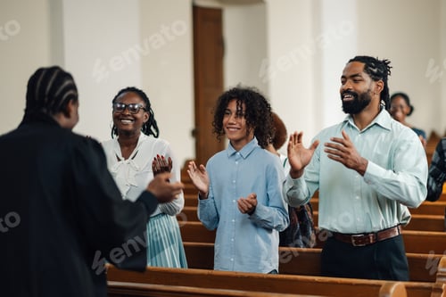 Preview: Congregation clapping along to gospel music in church