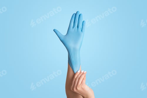 Preview: Putting on a Blue Protective Glove on Light Blue