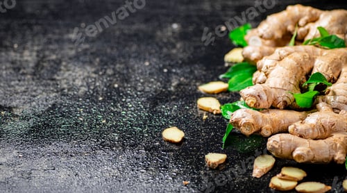 Preview: Pieces of fragrant ginger with leaves.