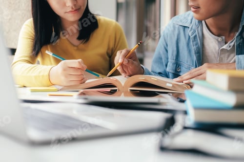 Preview: Young woman and man studying for a test or an exam