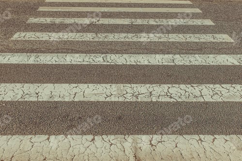 Preview: Closeup shot of the pedestrian crossing part of the road