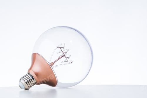 Preview: LED bulb on the white table with white background for eco saving