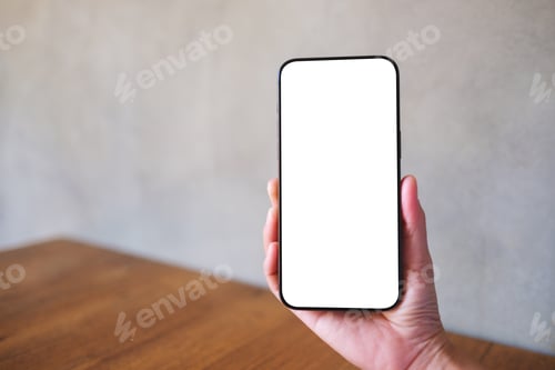 Preview: Mockup image of a woman holding black mobile phone with blank desktop screen