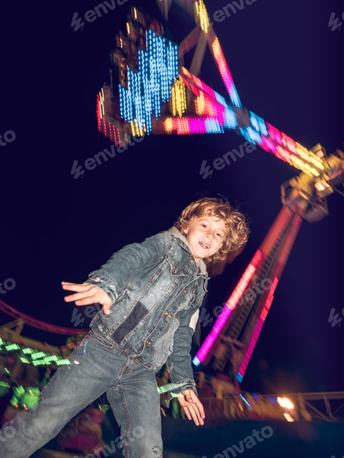 Preview: Excited little boy on funfair