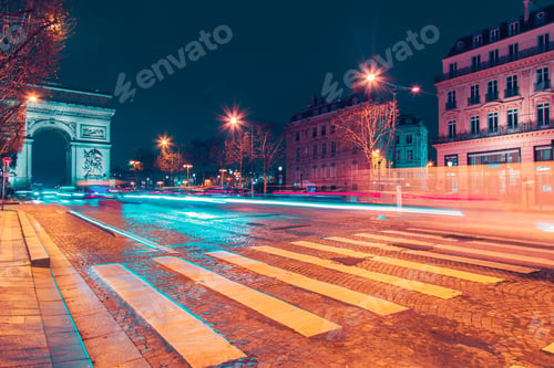 Preview: Champ élysées vehicle ligts view from pedestrian crossing during night time.