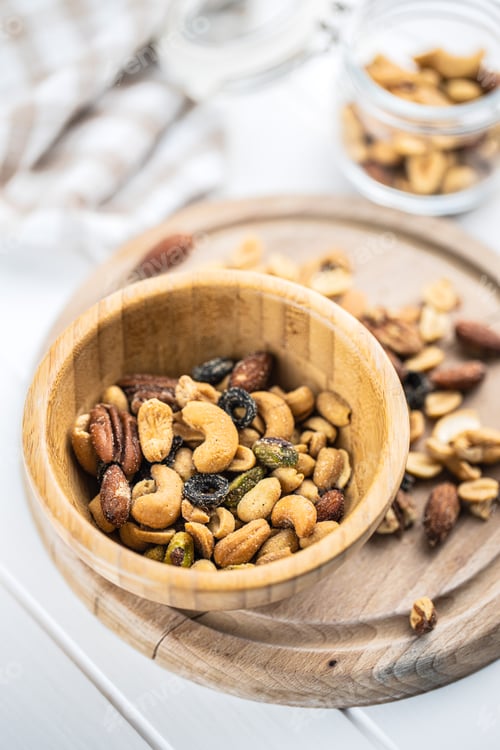 Preview: Bowl of Mixed Nuts on Rustic Board