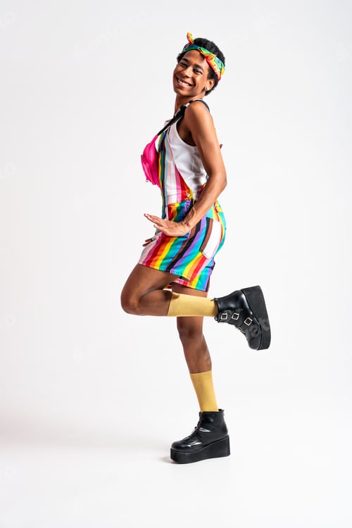 Preview: Fashionable fluid gender man posing in studio