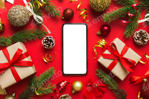 Preview: Digital phone mock up with rustic Christmas decorations for app presentation top view
