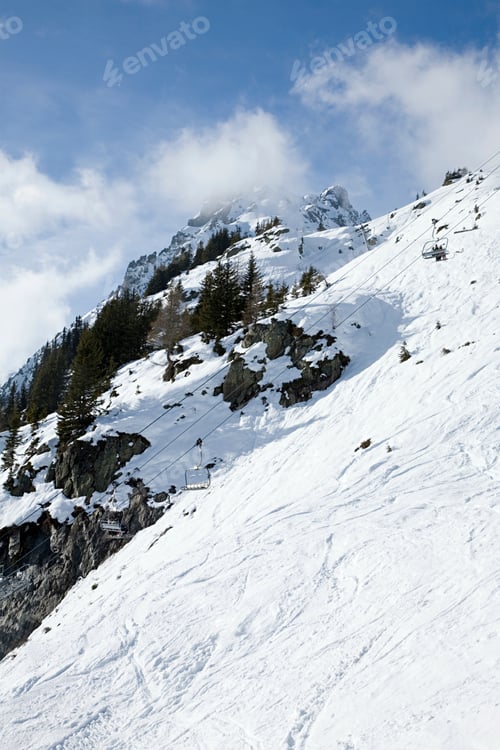 Preview: Ski lift near mountains