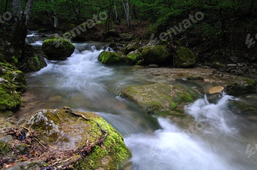 Preview: Stream with waterfall and mossy stones around