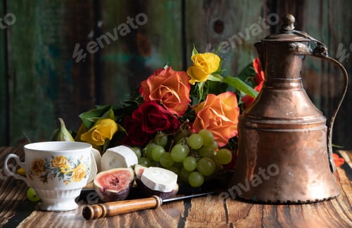 Preview: still life with goat cheese, grapes, roses and a copper teapot in the style of Dutch artists