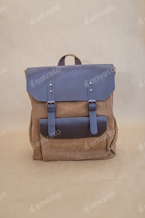 Preview: Canvas backpack isolated on beige background
