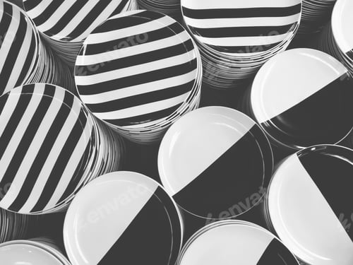 Preview: Many stacks of black and white ceramic plates in high angle view