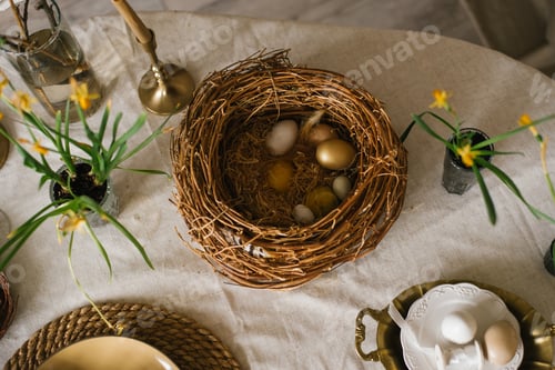 Preview: Wicker Bird's nest with Easter Eggs in it Sits on a table